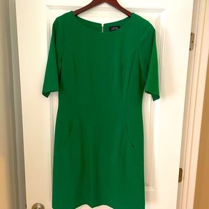 Tahiti size 10 green dress with pockets.